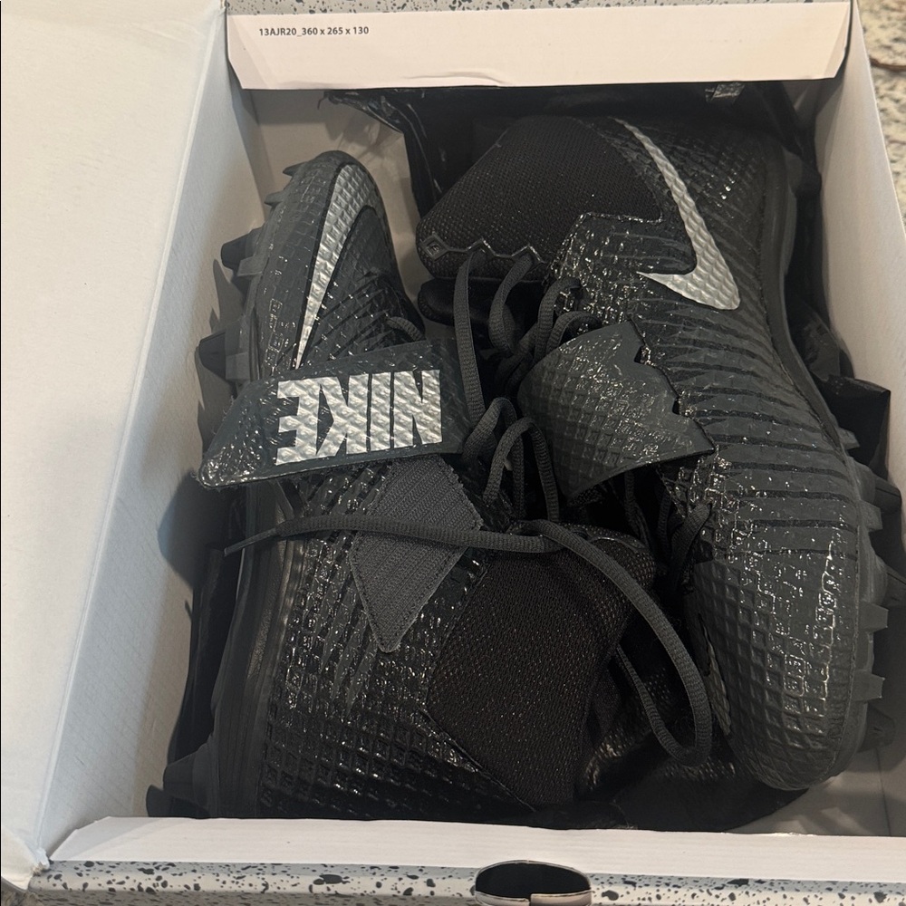 Nike Black and Silver Sports Cleats